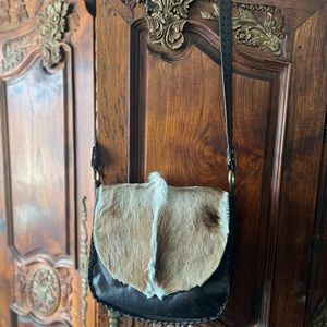 UNIQUE! ‘Limited Edition’ Caribou hide w/fur from “The Loom” in Skagway Alaska.